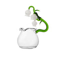 Glass teapot on white background