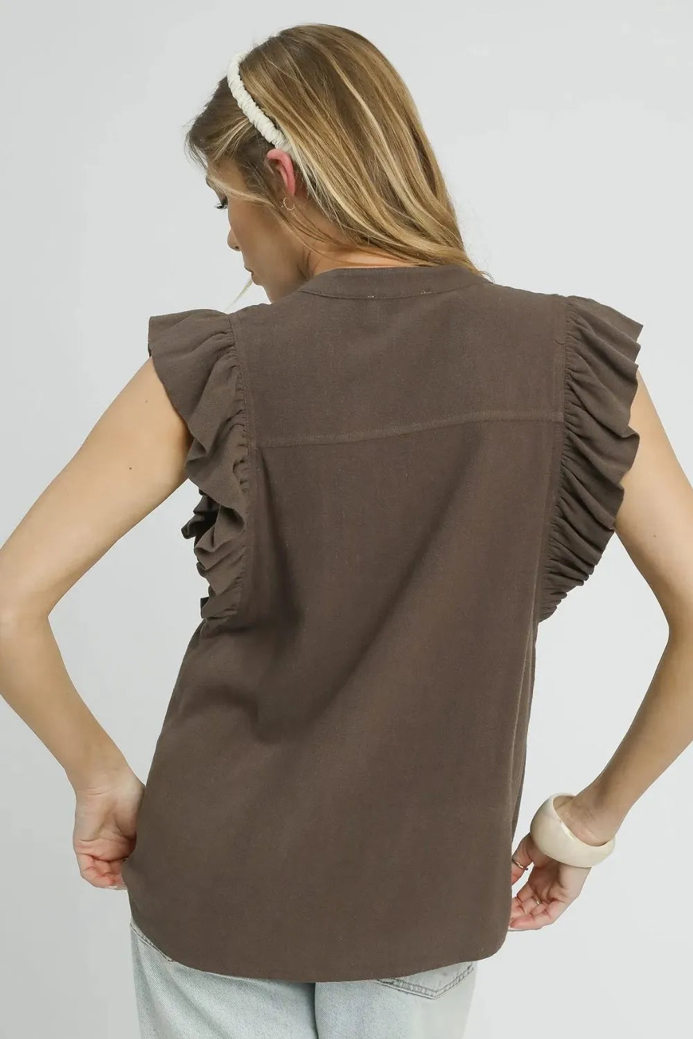Back view of the Linen Ruffle Sleeve Button‑Down Top showing relaxed silhouette and ruffle sleeve design.