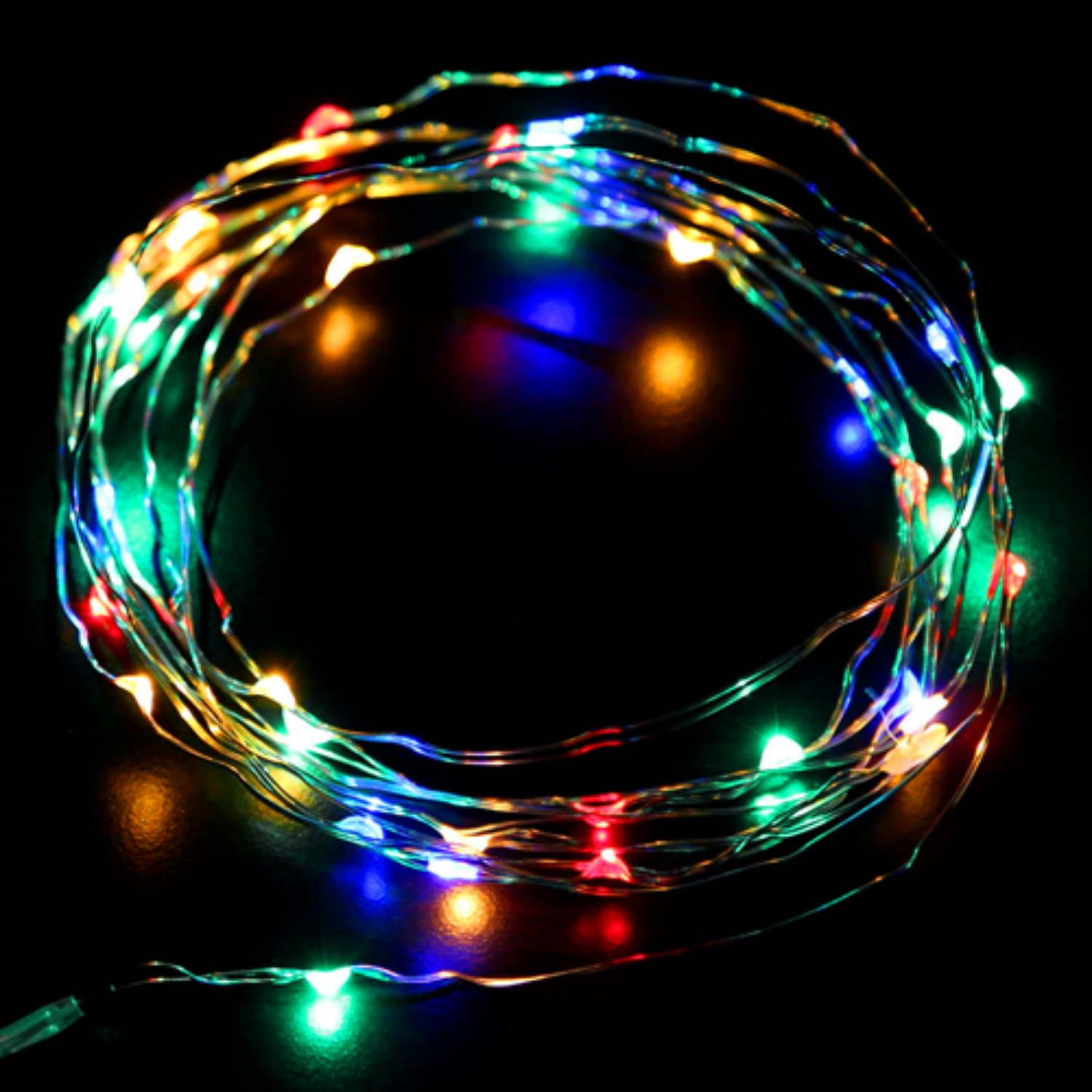Multicolored string lights on a black background