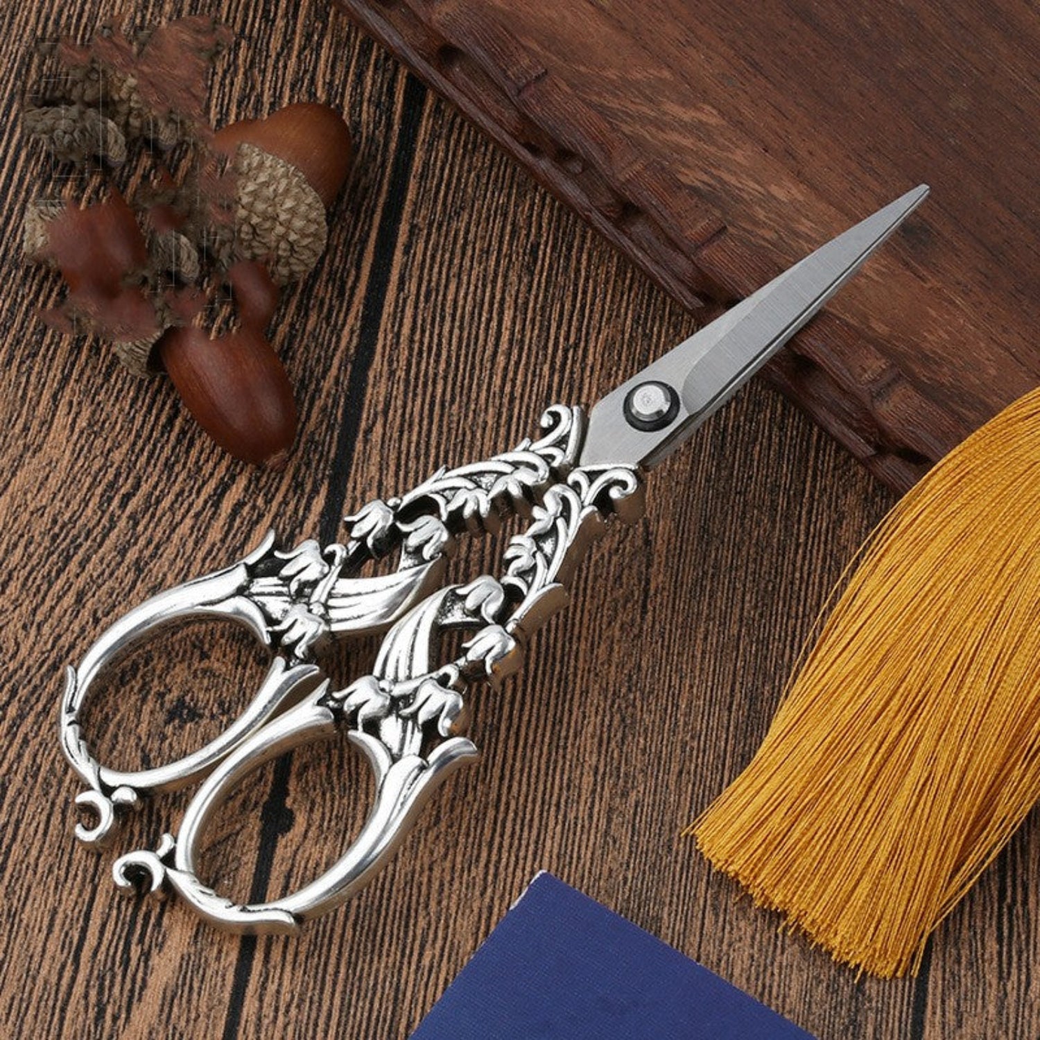 scissors on wooden background