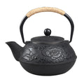 cast iron teapot on a white background