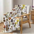 mushroom blanket thrown over a chair in room

