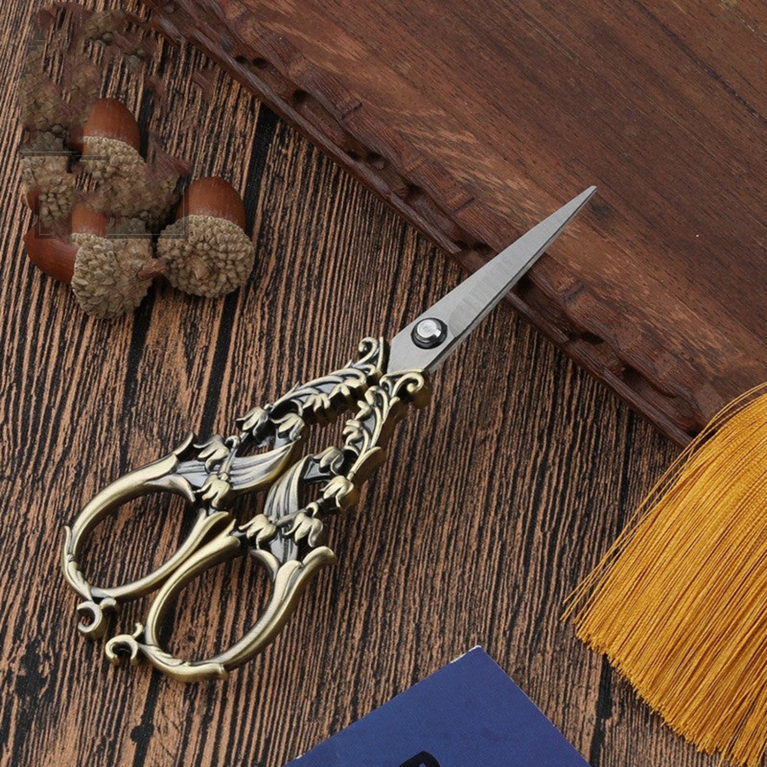 scissors on a wooden background