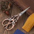 scissors on wooden background