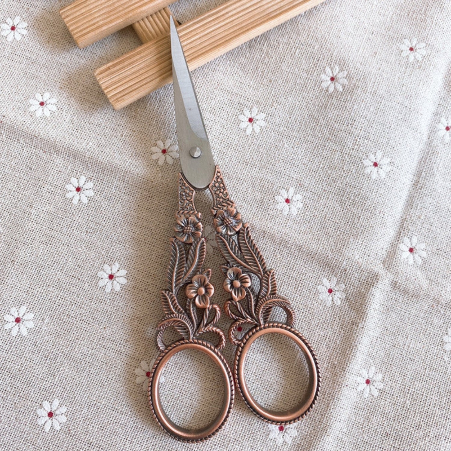 scissors on white flower background