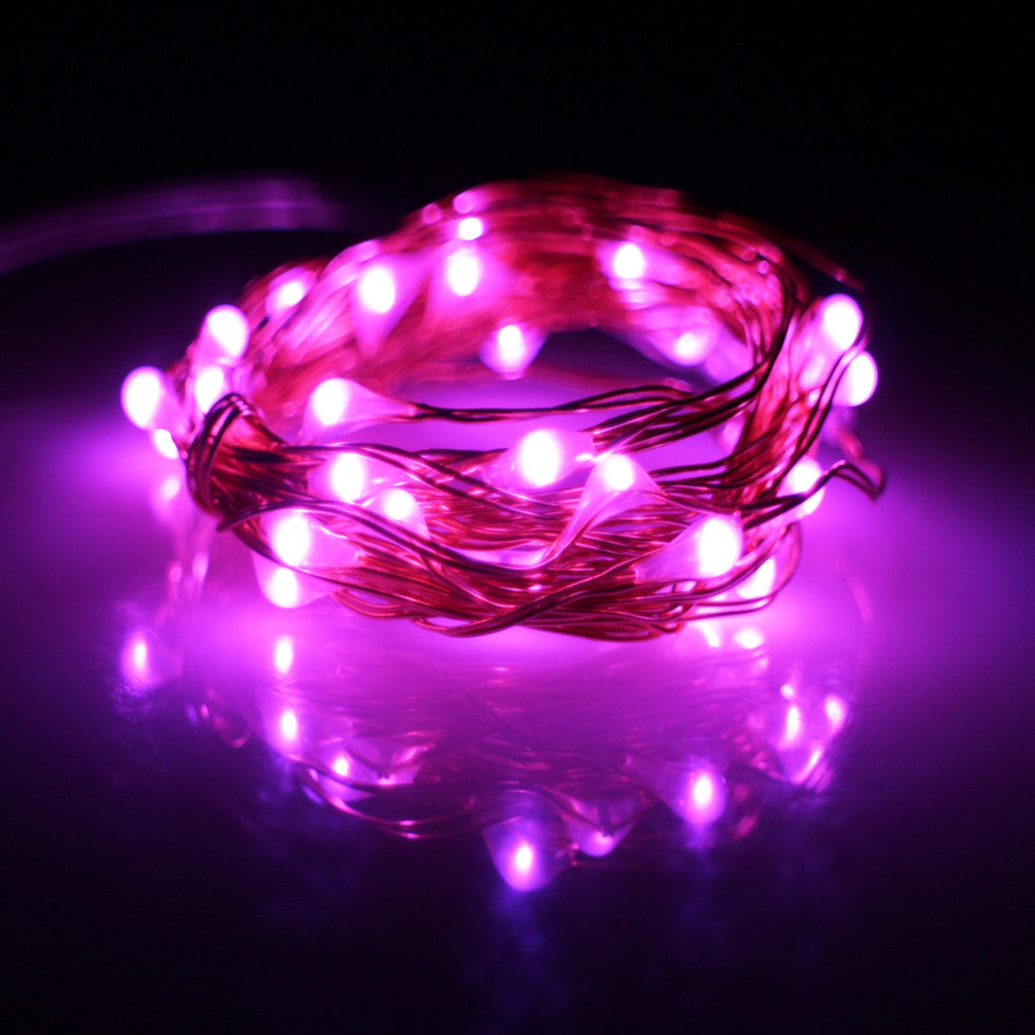 String of red LED lights on a dark background