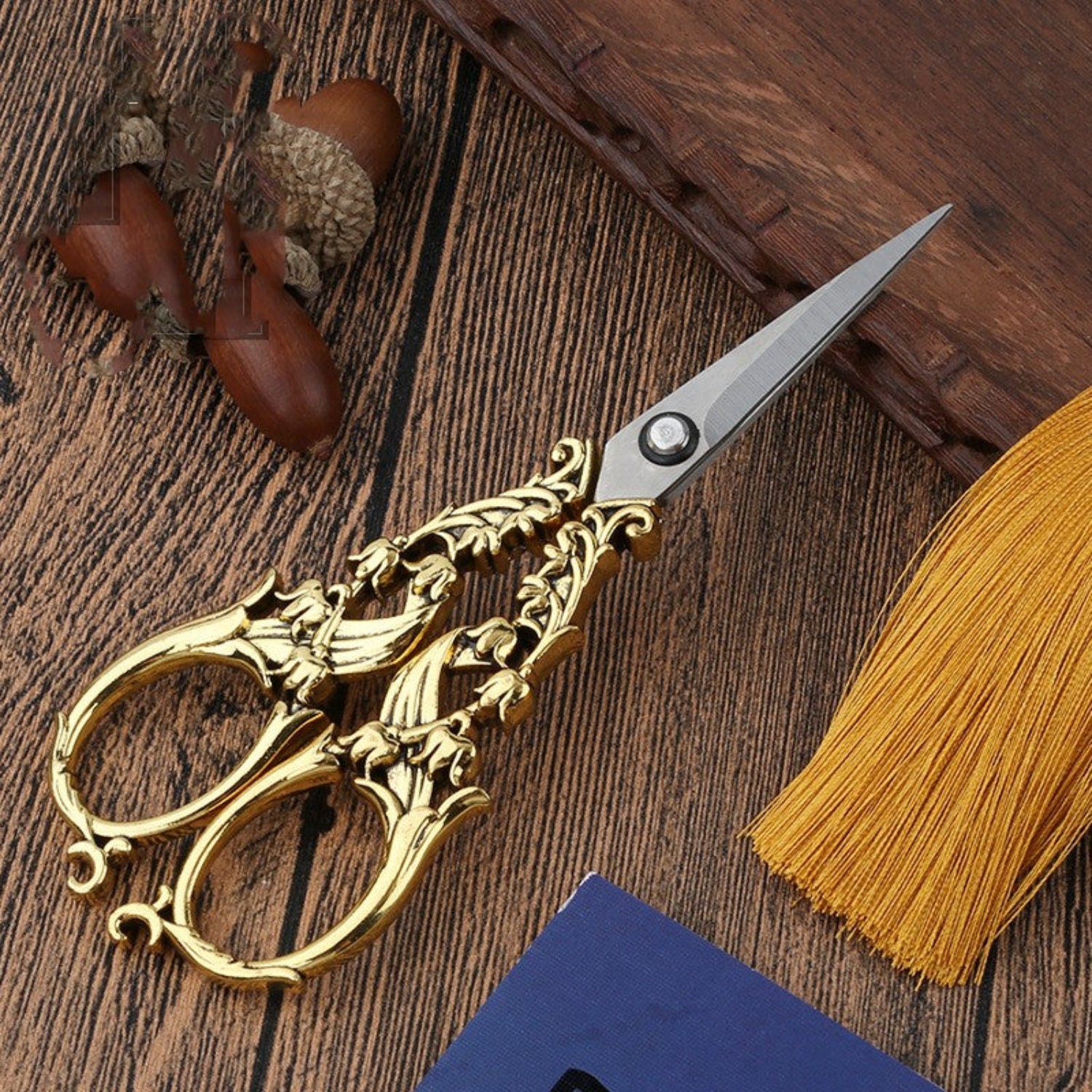 scissors on wooden background