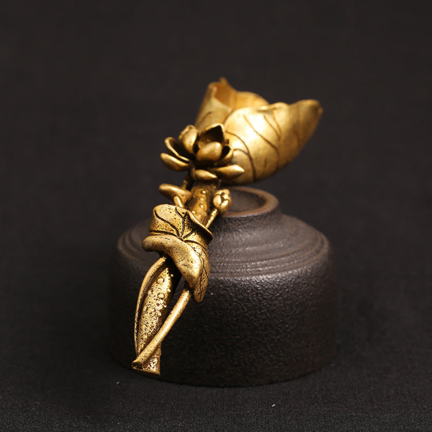 handle view Pure brass lotus leaf tea shovel with a sculpted lotus flower and leaf‑shaped scoop, shown in a golden antique finish