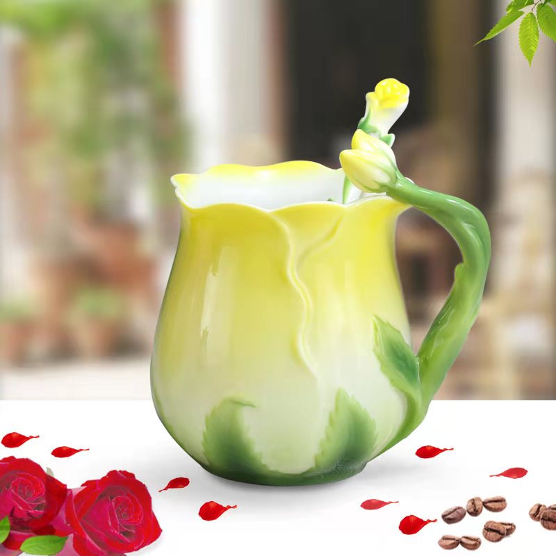 rose teacup and stirrer on a table